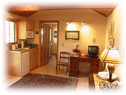 View of kitchen and writing desk